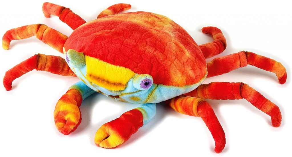 Juguete de cangrejo de peluche rojo para perros y gatos foto sobre un